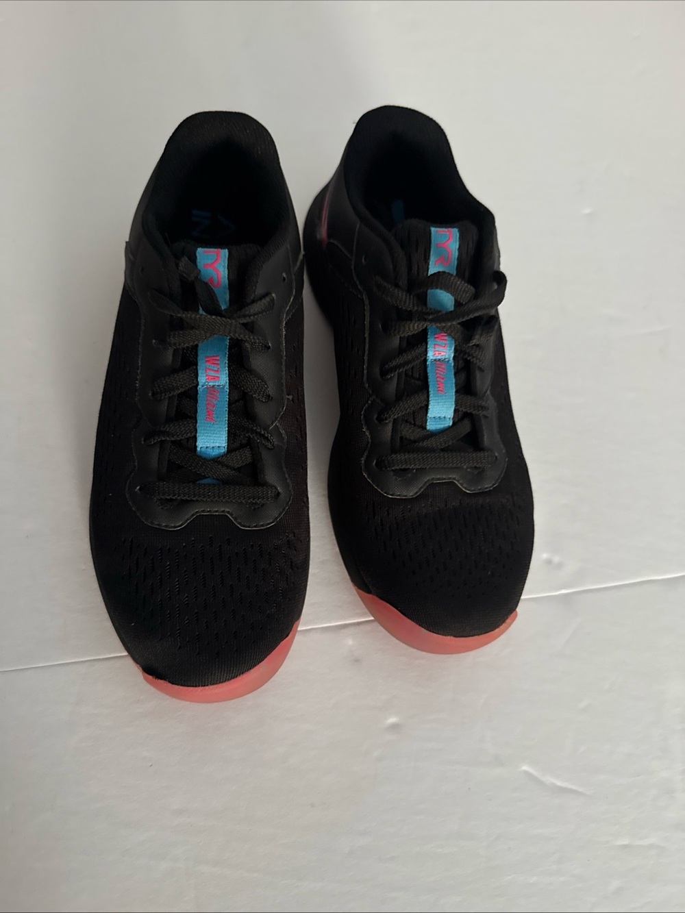 TYR men  Black Sneakers with Coral Soles and Teal Tongue Accent